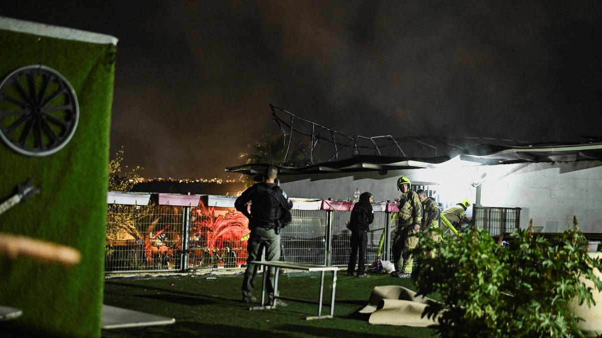 Iran missile fire sparks explosions over Tel Aviv, no reported injuries