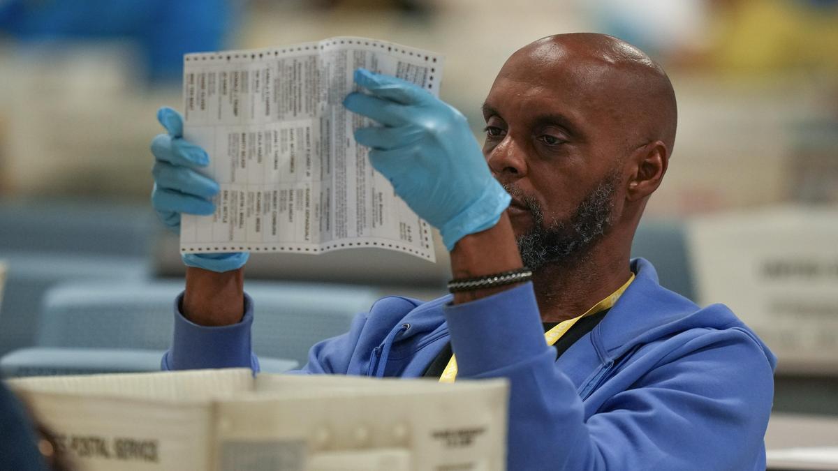 Trump pushes Republicans on voting bill, demanding an end to most mail balloting