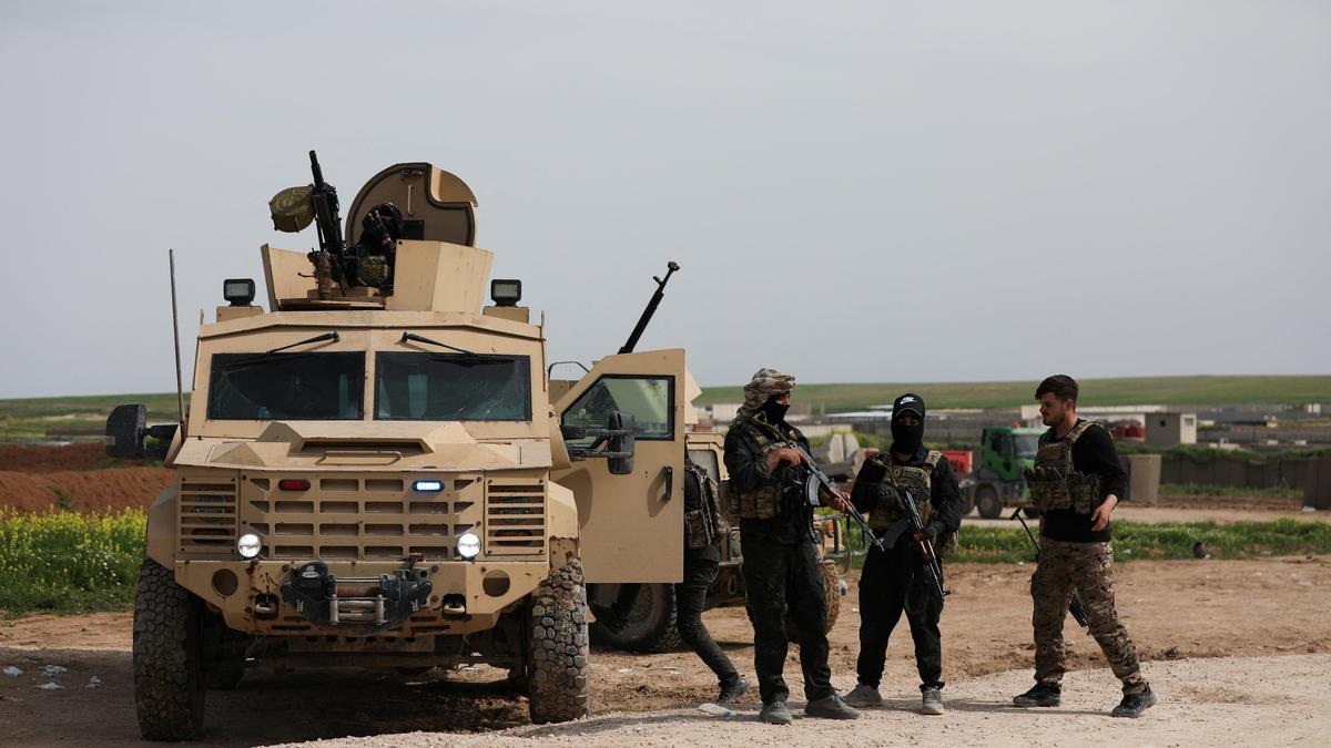 Syria says takes over northeast base after international coalition pullout